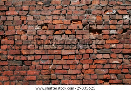 A 102 year old brick wall with alternate layers of headers and layers.