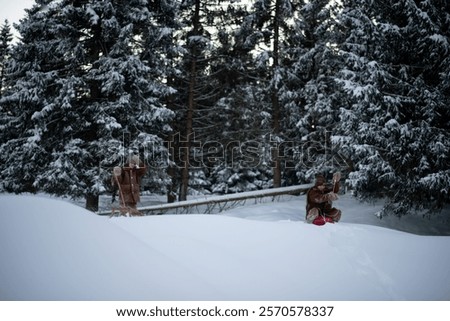 Similar – Image, Stock Photo Little girl sledding at Sierra Nevada ski resort.