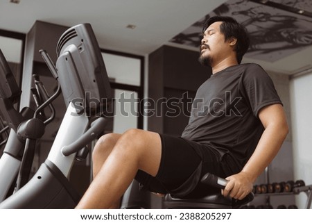 Similar – Image, Stock Photo man resting while riding a bicycle on a mountain road