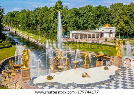 PETERHOF, RUSSIA - JUNE 22, 2012: Grand Cascade and sea canal in Peterhof, St Petersburg, Russia on June 22, 2012. The Peterhof palace was included in the UNESCO\'s World Heritage List in 1991.
