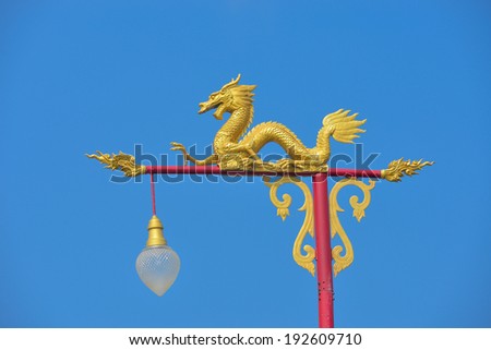 Dragon sculpture on the light pole.