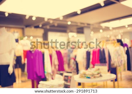 Blurred image of shopping mall and bokeh background : Vintage filter