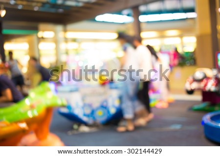 Arcade game machine shop blur background with bokeh image
