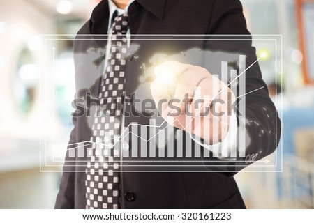 Businessman standing posture hand touch financial symbols coming