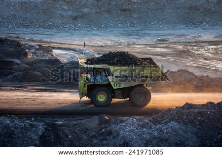 LAMPANG, THAILAND - DEC 29: coal-preparation plant. Big  mining truck at work site coal transportation, December, 29, 2014 in Lampang, Thailand