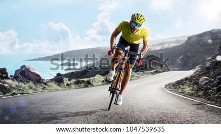 Professional road bicycle racer in action Imagine de stoc © 