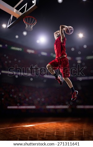 red Basketball player in action in gym
