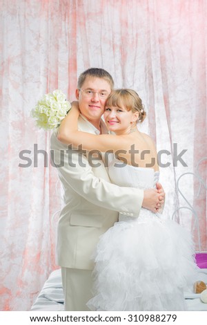 Bride and groom in wedding studio photo session