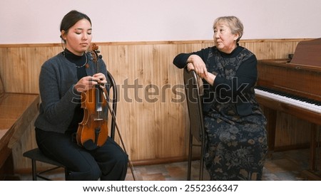 Similar – Image, Stock Photo Young student violinist
