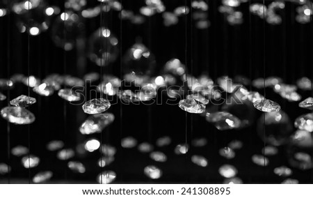Chrystal chandelier close-up. Glamour background with copy space. Black & white