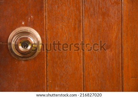 door knock and wooden background