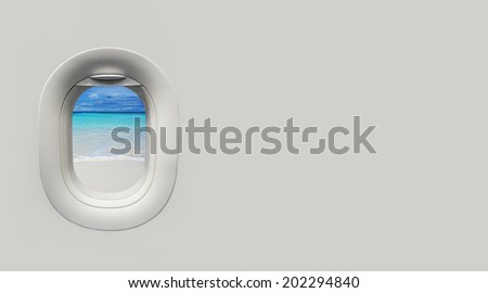 beach and tropical sea at Airplane window and place for text
