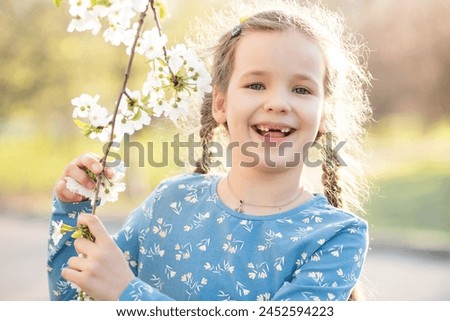 Similar – Image, Stock Photo Toothless girl smiling for camera