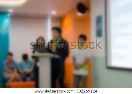 Abstract blurred people in class room, education concept