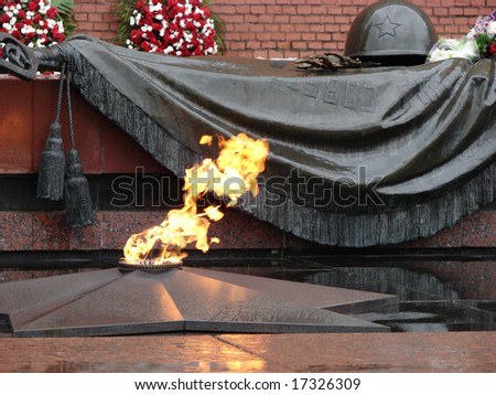 Monument to the unknown soldier, eternal fire, about the Kremlin wall, the Aleksandrovsky garden, Moscow. Red Square