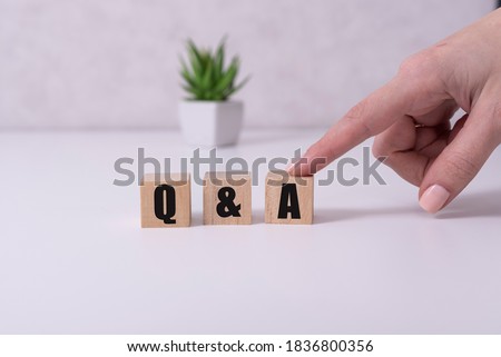 Close-up Shot of Q and A wooden blocks. Stock foto © 