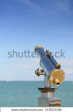 Coin operated telescope to view the seascape on a french island