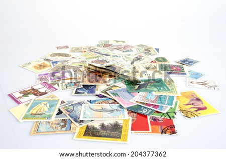 backdrop of old worldwide postage stamps