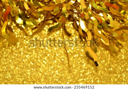 Striking golden ribbons for Christmas & Chinese New Year decorations / Christmas & Chinese New Year celebrations / golden backgrounds