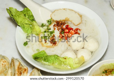 A hearty meal of teowchew fishball noodle for light eater during breakfast or lunch / Fishball noodle / Made exclusively of fish paste and moulded into balls or fishcake slices, healthy eating