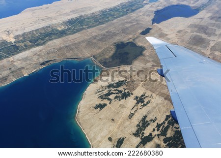 Aircraft wing on the clouds, flying background Croatia, view from airplane, Coast and Islands of Croatia