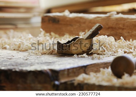.Small Block Plane and Wood on work bench with shavings