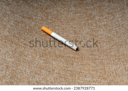 Similar – Image, Stock Photo Filter cigarette lies on a wooden table