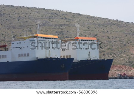 Cargo Ships anchored side by side in the harbour at Cesme, Turkey