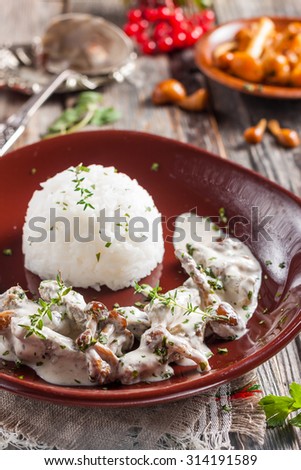 Beef Stroganoff with mushrooms and rice. Russian kitchen