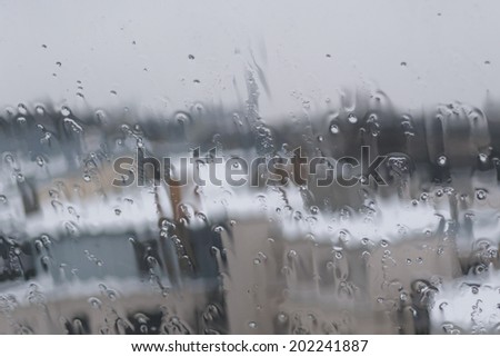 Rain on the window's glass.