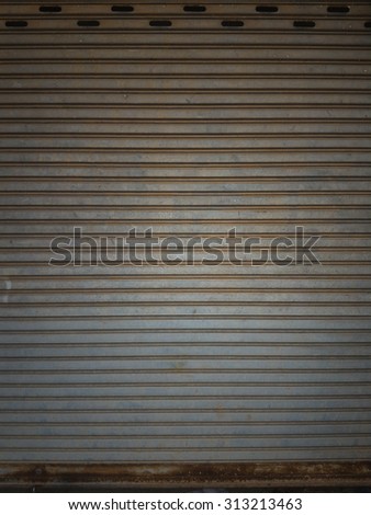 grunge metallic roller shutter door. shutter steel door texture