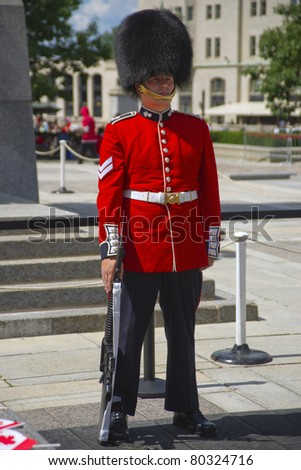 OTTAWA, CANADA - JULY 1:  A member of the Ceremonial Guard stands in full dress at the Tomb of the Unknown Soldier at the War Memorial in Ottawa, Ontario Canada on Canada Day, July 1, 2011.