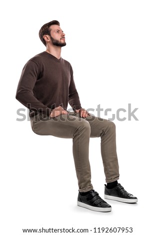 Similar – Image, Stock Photo Man sits on a white horse bridled with a bosal and looks for a carrot in his jacket pocket in thanks for the horse carrying him. In the background are blurred autumn trees.