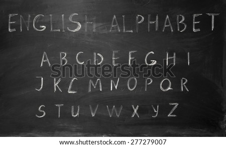 Twenty six letters of English alphabet, upper case, written on the blackboard