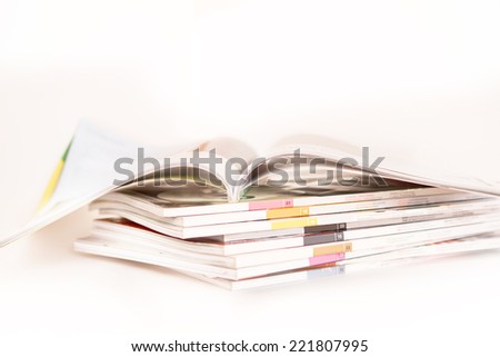 Open Magazine on stack of magazines