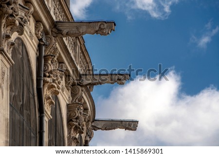 Stone sculptures on facade of the Saint Eustache church (glise Saint-Eustache), Les Halles against the blue cloudy sky. Gothic facade, Paris, France Photo stock © 