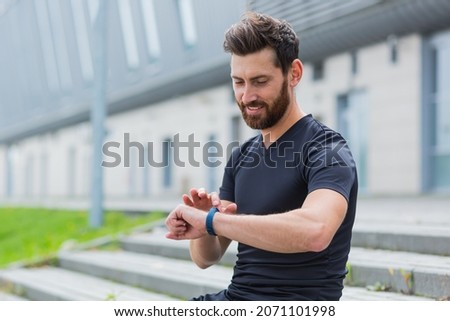 Similar – Image, Stock Photo Sport watch at man wrist