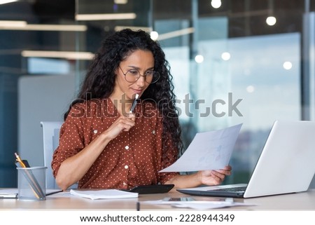 Similar – Image, Stock Photo young latin woman sitting alone home office working on a laptop and listening to music on earphones, Mexican girl in Mexico working at home