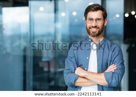 Similar – Image, Stock Photo Portrait of a young man smoking, studio shooting, black and white , close up view. led ring reflection in the eyes