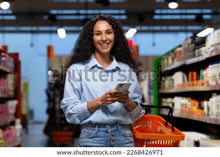 Similar – Image, Stock Photo Smiling woman looking between open door and wall