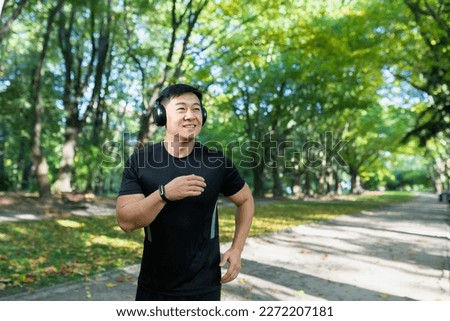 Similar – Image, Stock Photo Ethnic sportsman using tracker on street