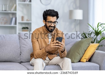 Similar – Image, Stock Photo Black man using smartphone on street