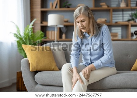 Similar – Image, Stock Photo Legs of woman sitting in sea water