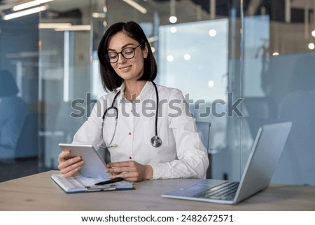 Similar – Image, Stock Photo doctor woman indoors, using mobile phone. Wearing protective gloves, mask and stethoscope. coronavirus covid-19 concept