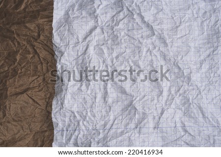 white graph paper and kraft paper fringe