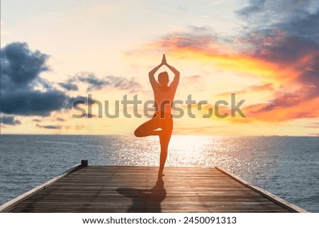 Similar – Image, Stock Photo Flexible woman doing yoga on paddleboard