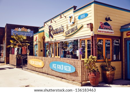 MORRO BAY - JULY 24: Facade of Rocca\'??s Surf Shack restaurant on Jily 24, 2012 in Morro Bay, CA. Rocca\'??s Surf Shack is a surfer-themed cafe offering a spectacular view of the bay and Morro Rock