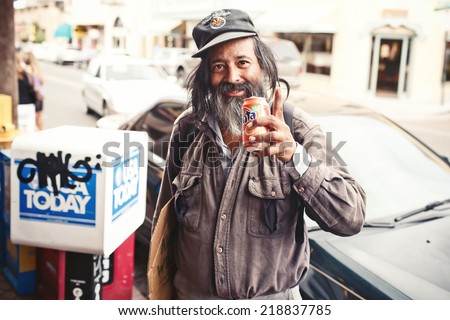 NEW MEXICO, USA - AUGUST 12, 2012: Beggar man in Santa Fe on August 12, 2012, New Mexico, USA