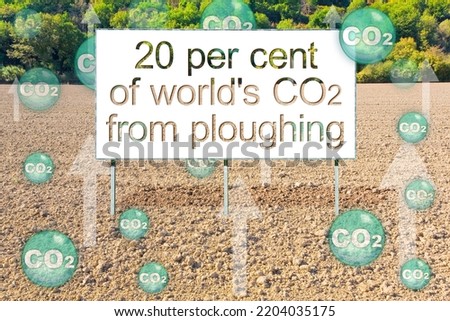 Recent scientific research shows that 20 per cent of world’s CO2 from ploughing - CO2 emissions from plowed fields - concept image in rural scene with billboard Stok fotoğraf © 