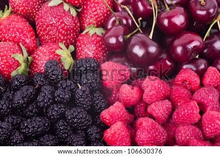 Berry Mix background - strawberry, raspberries, mulberry and cherry